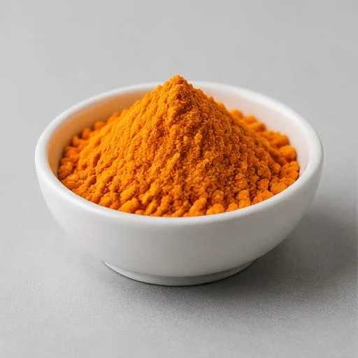 Illustration of orange Coenzyme Q10 powder in a dish
